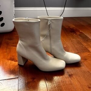 White boot heels, never worn